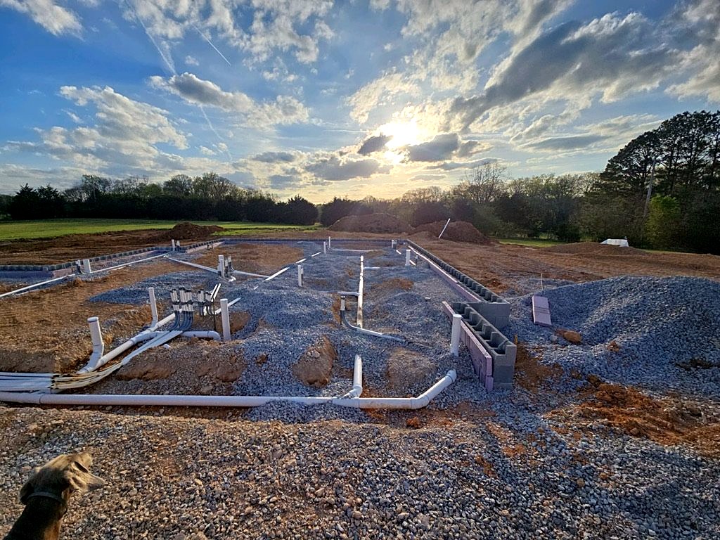 Foundation and plumbing rough-in on a custom home lot in Middle Tennessee