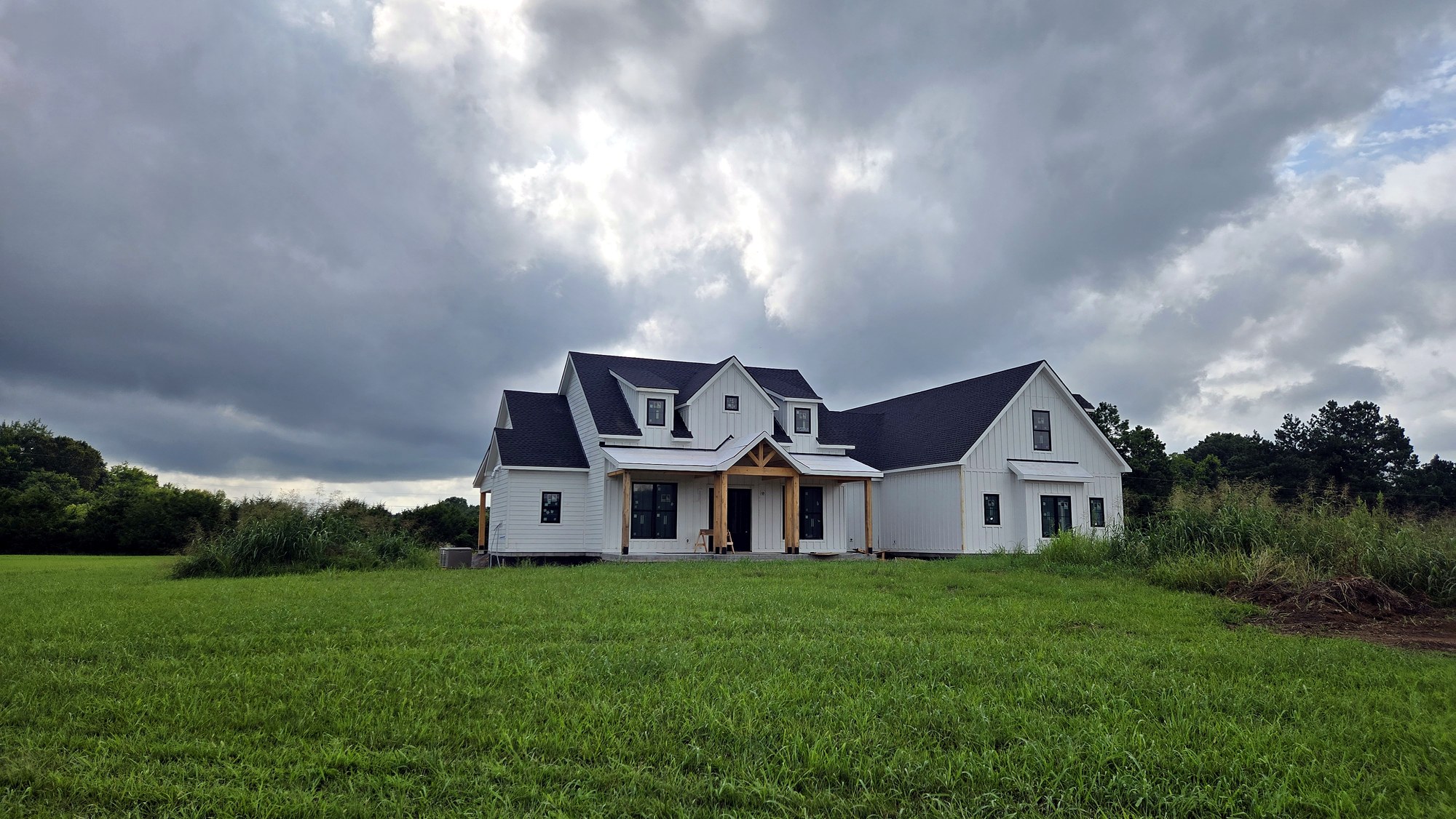 Custom farmhouse front elevation — Columbia, TN by Muller Homes