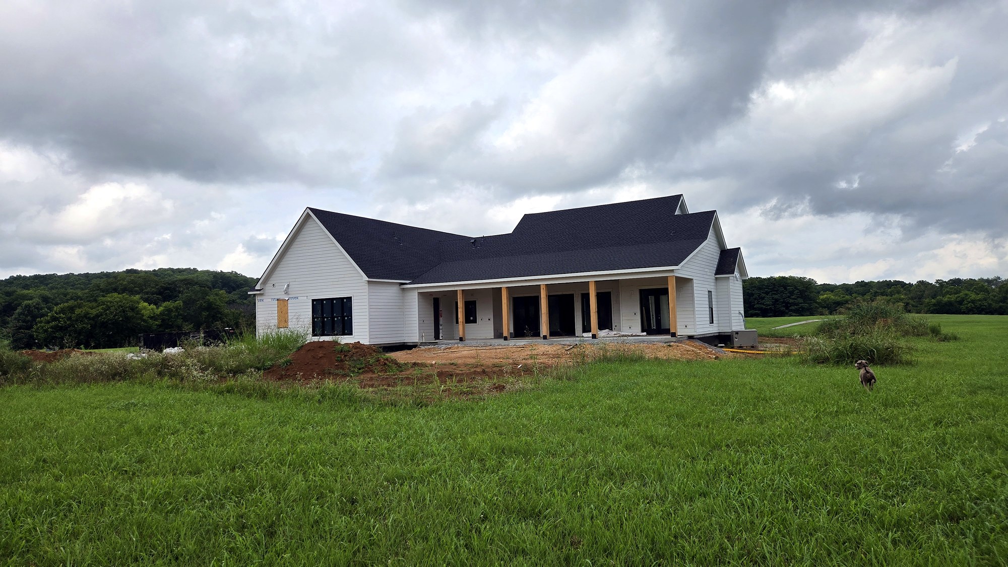 Custom farmhouse rear with covered porch — Columbia, TN
